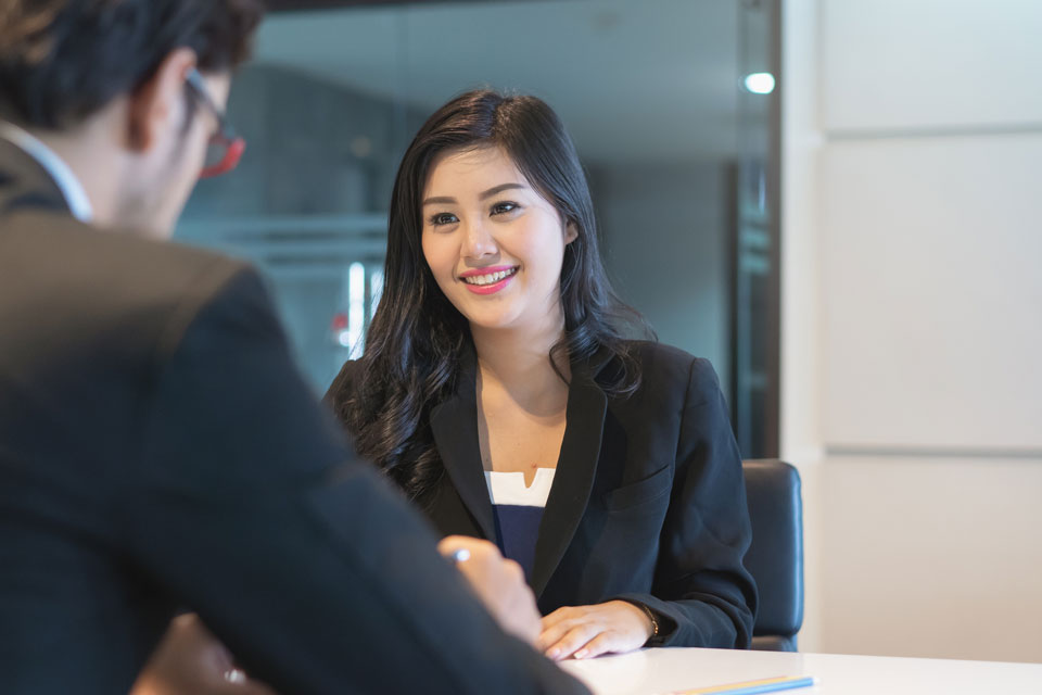 A young woman during a job interview.