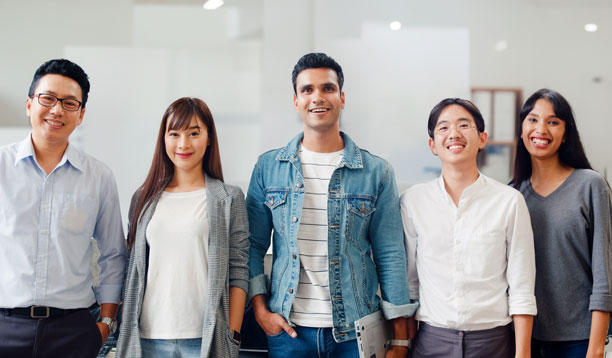 A row of smiling young people of Asian heritage.