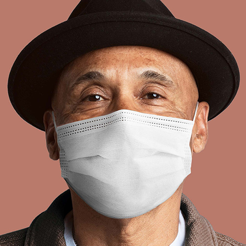 An older black man wearing a surgical mask.
