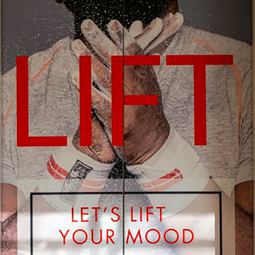 Elevator door image of hands with a caption that reads LIFT Let’s lift your mood in red