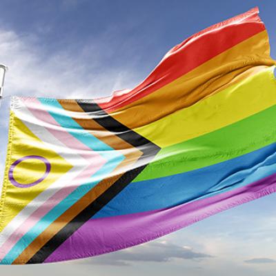 The Inclusive Pride Flag blows in the wind. 